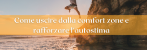 uomo che fa un grande salto da uno scoglio