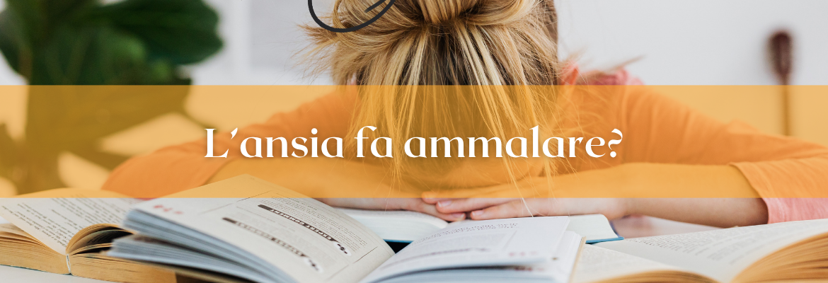 donna che ha la testa abbassata sopra un libro
